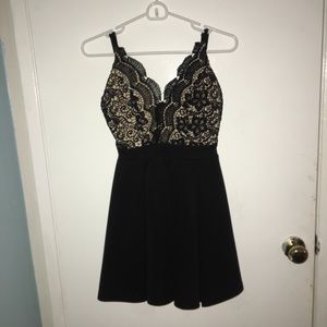 Black and beige dress